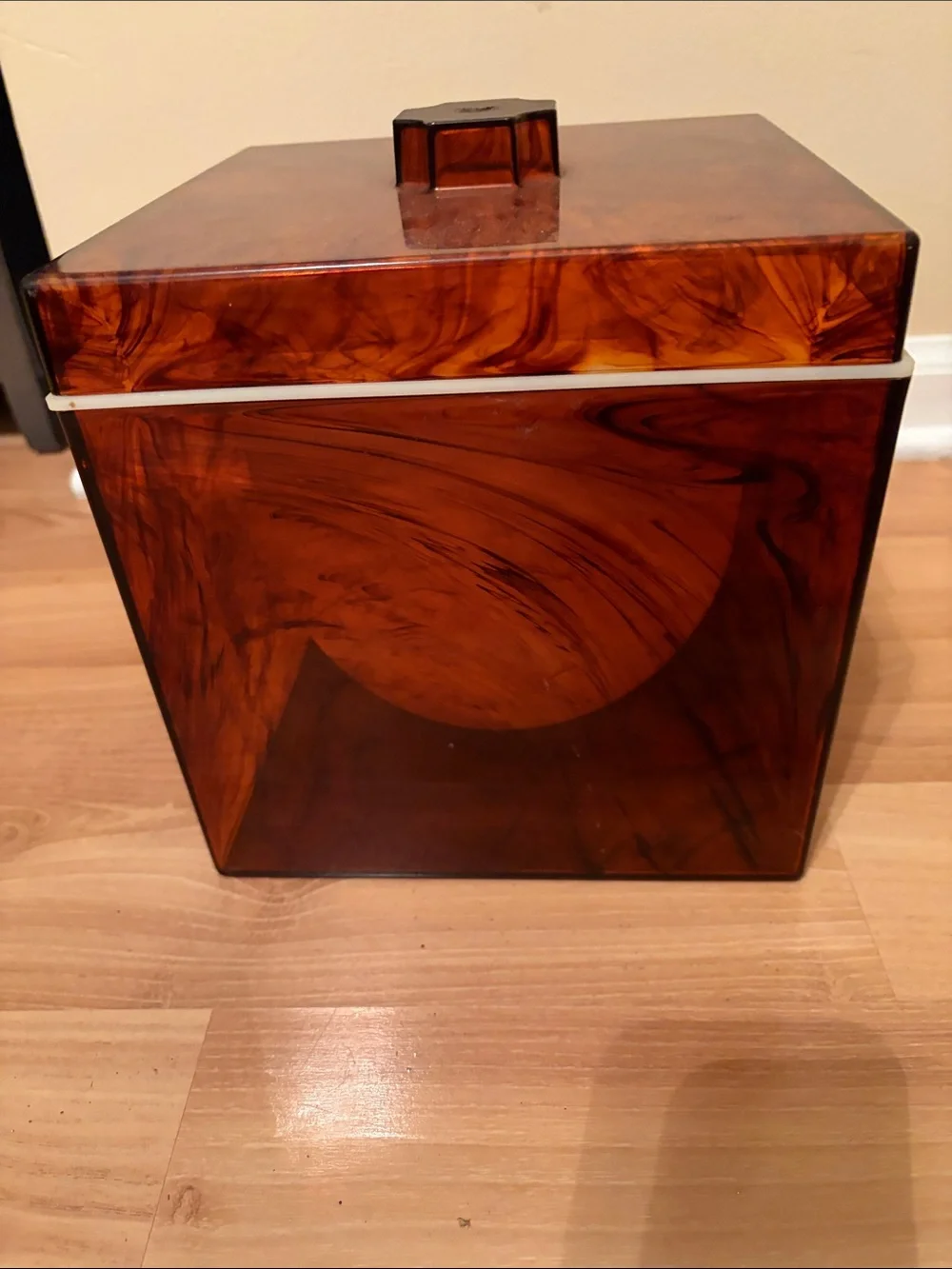 Vintage 1970s ice bucket features a faux tortoise shell pattern made of acrylic
